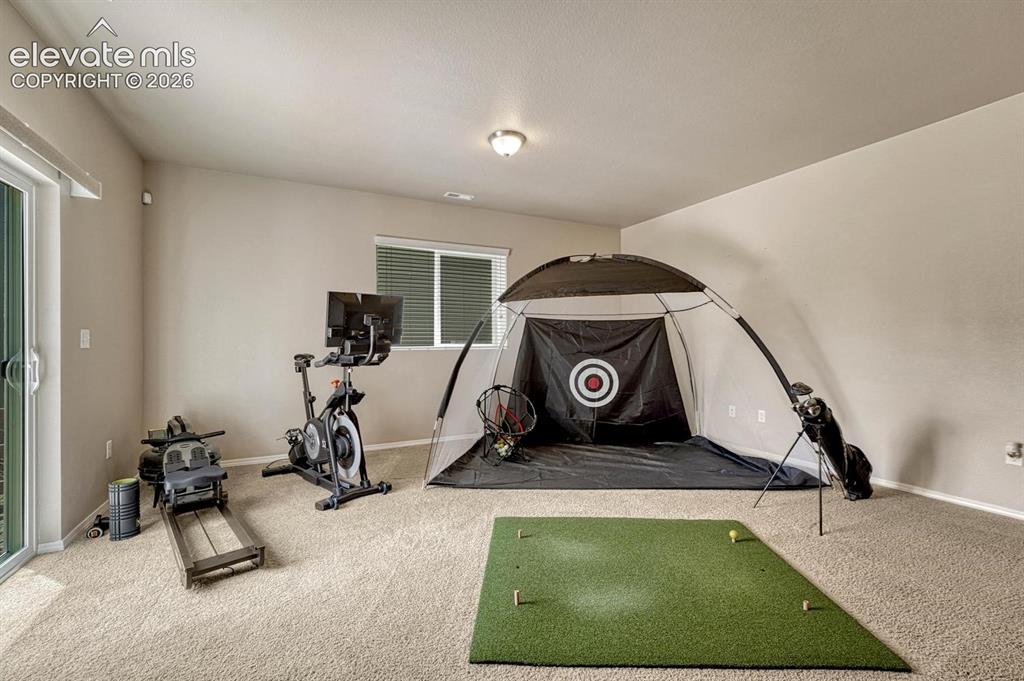 Image 36 of 50: Game and gym areas in the Family/Rec Room.