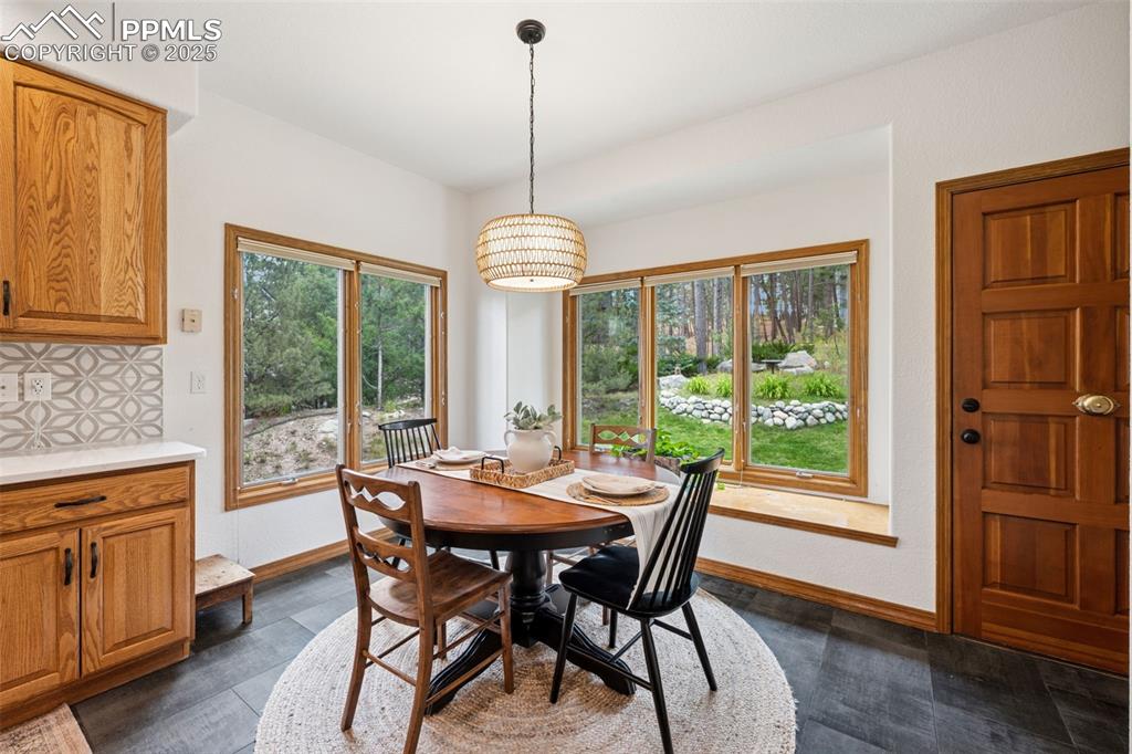 Image 17 of 39: Dining area with plenty of natural light