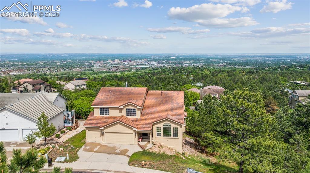 Image 2 of 43: Aerial view of property and surrounding area