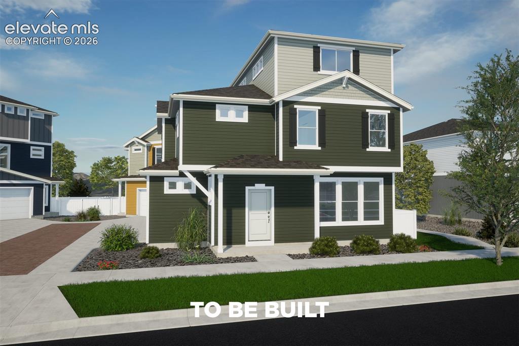 Image 1 of 35: Three-story exterior with dark green siding, white trim accents, and a cove