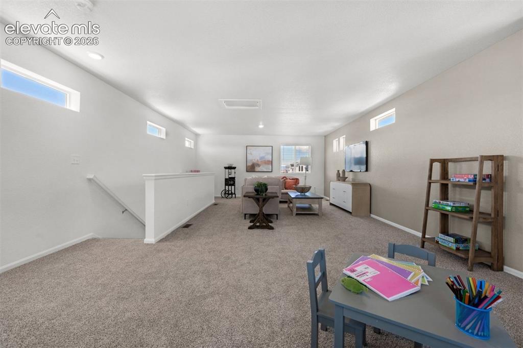 Image 29 of 35: *photos of a model home*