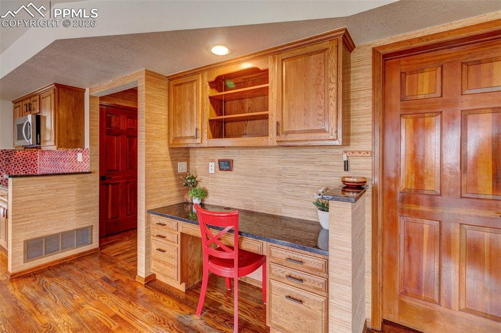 Image 14 of 39: Desk area in kitchen