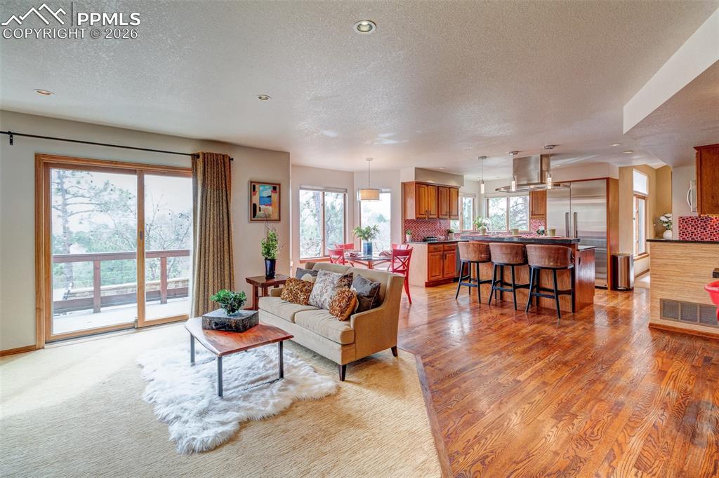 Image 16 of 39: Family room looking toward kitchen
