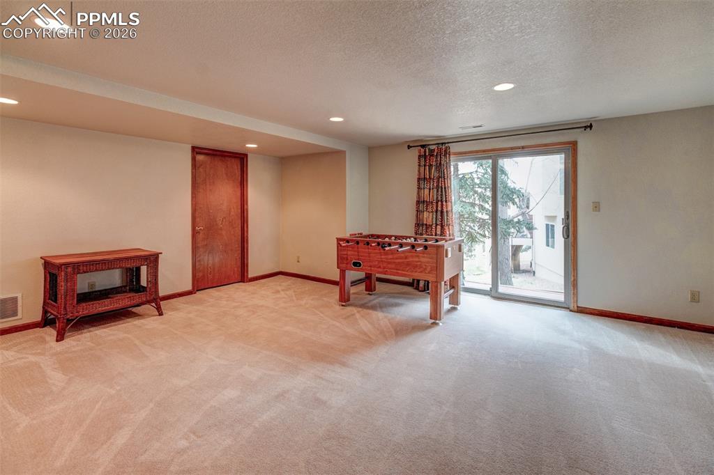 Image 36 of 39: Lower level rec room 