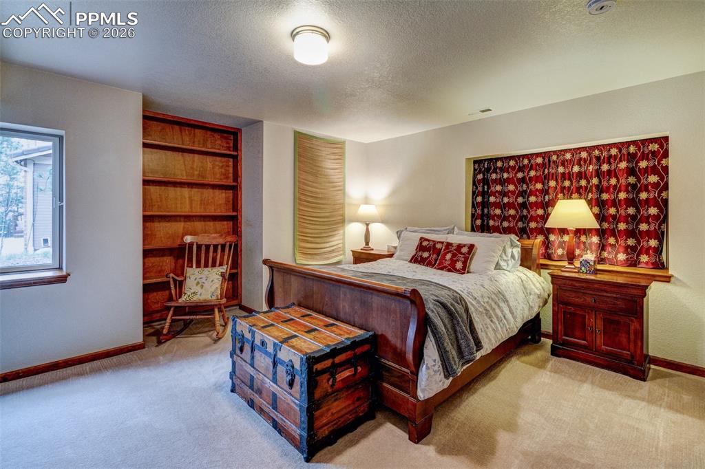 Image 38 of 39: Second lower level guest bedroom