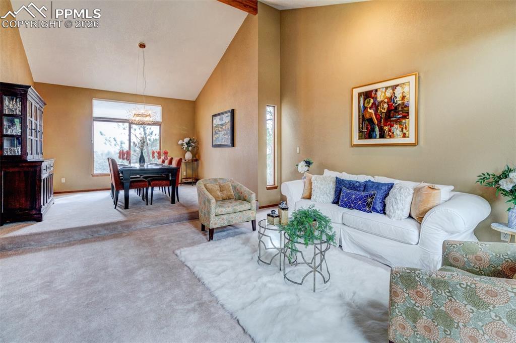 Image 6 of 39: Living room and Dining room