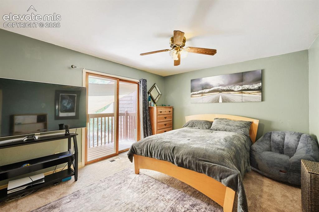 Image 21 of 34: Upper Level Spare Bedroom 