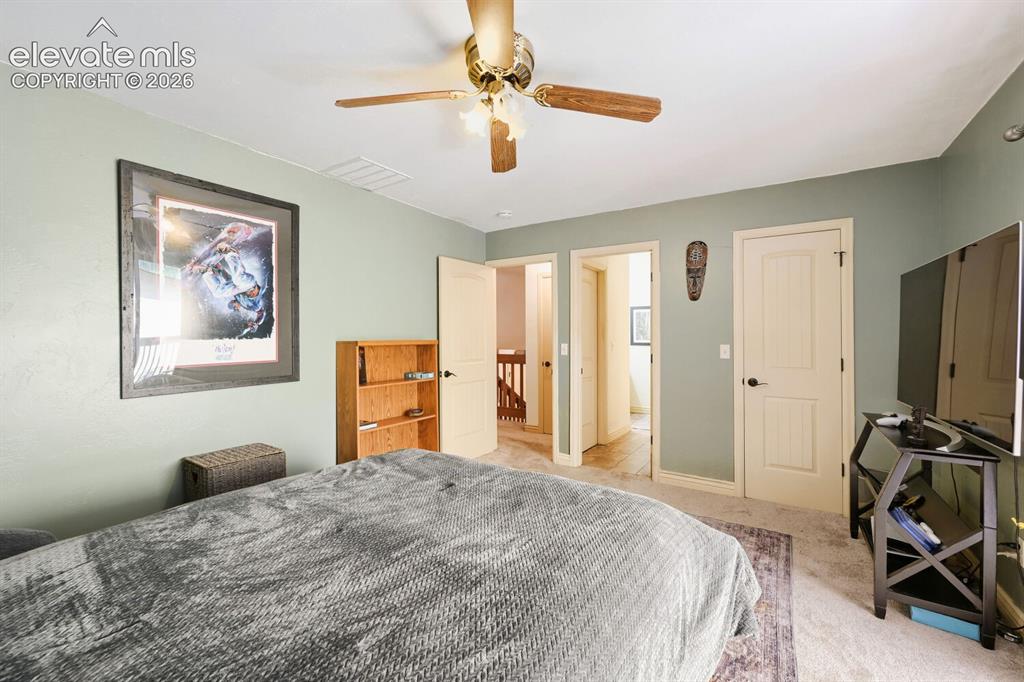 Image 22 of 34: Upper Level Spare Bedroom 
