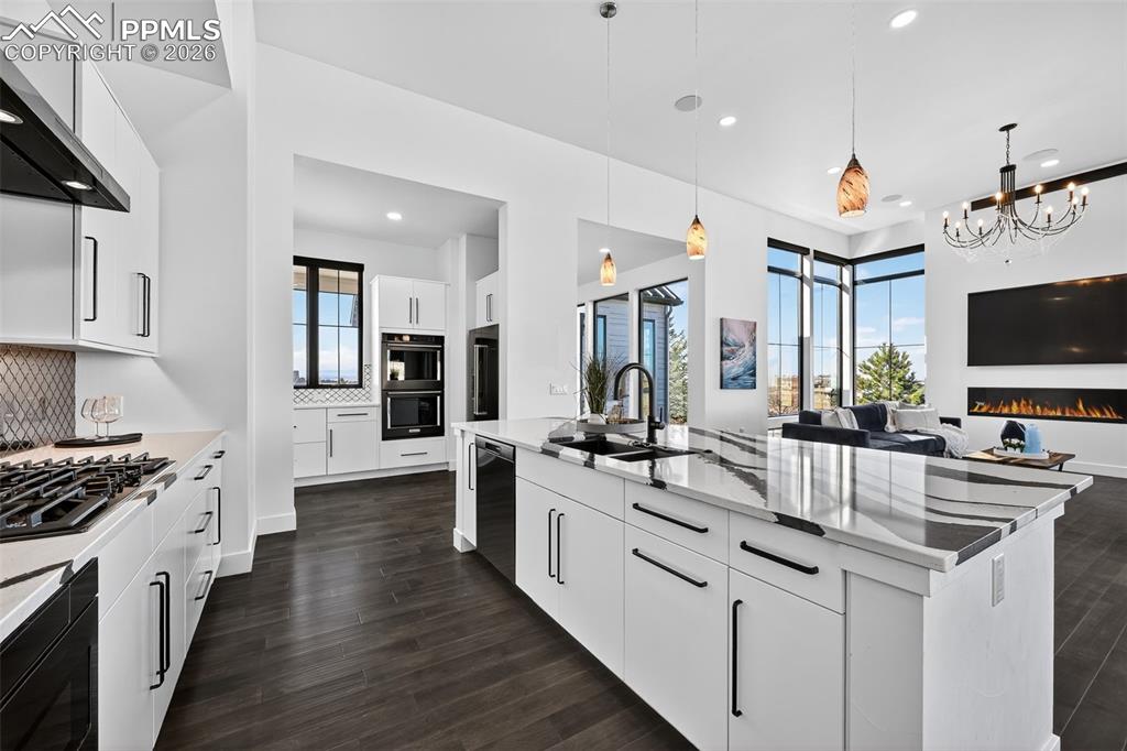 Image 11 of 44: Large white kitchen