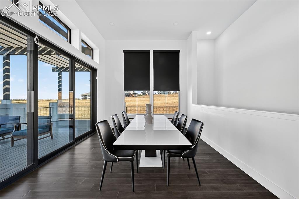 Image 19 of 44: Walk out dining room to back patio