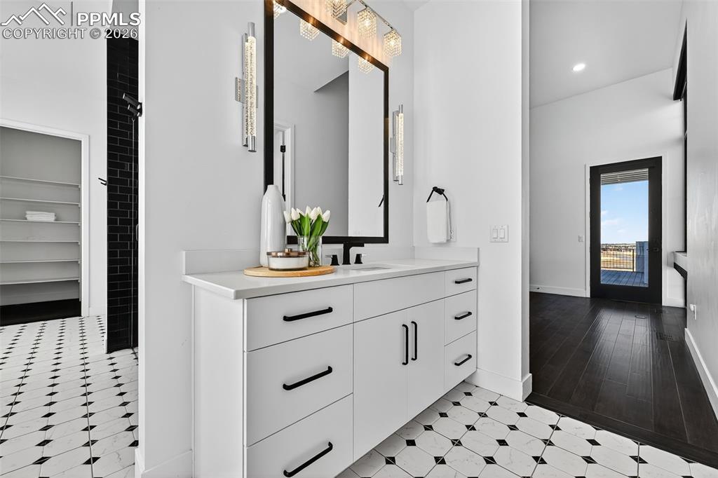 Image 26 of 44: Separate vanities in Master Bath