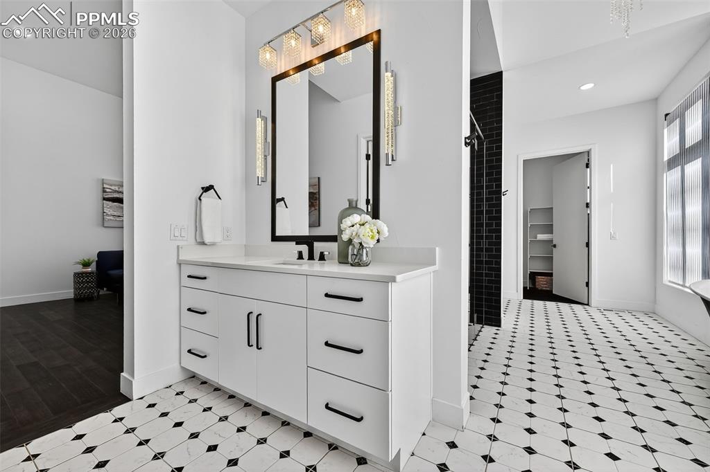 Image 31 of 44: Large wrap around Master Bath