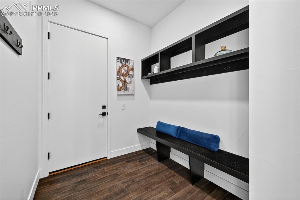 Image 32 of 44: Large Mudroom with built-in bench