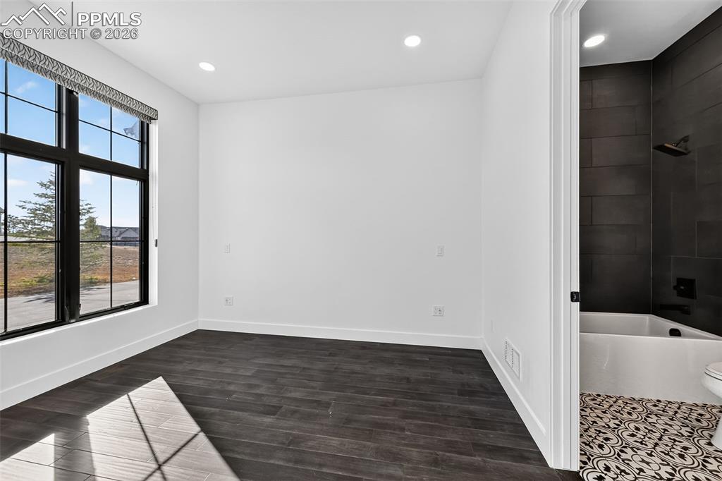 Image 34 of 44: Secondary Bedroom on Main floor