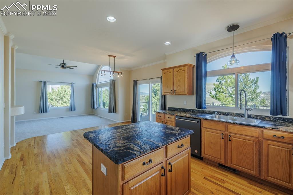 Image 22 of 49: Kitchen is open to the Family Room