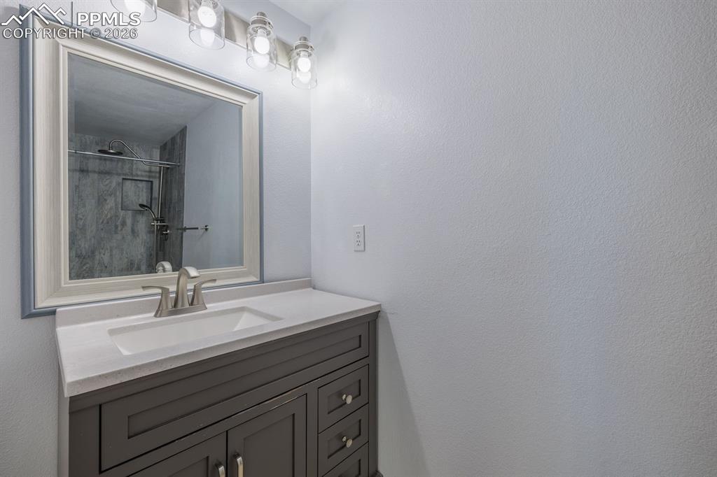 Image 36 of 49: Remodeled Basement Bathroom