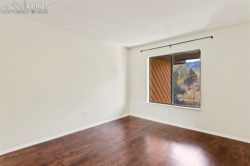 Image 14 of 29: Incredible views out the 2nd bedroom on the upper level