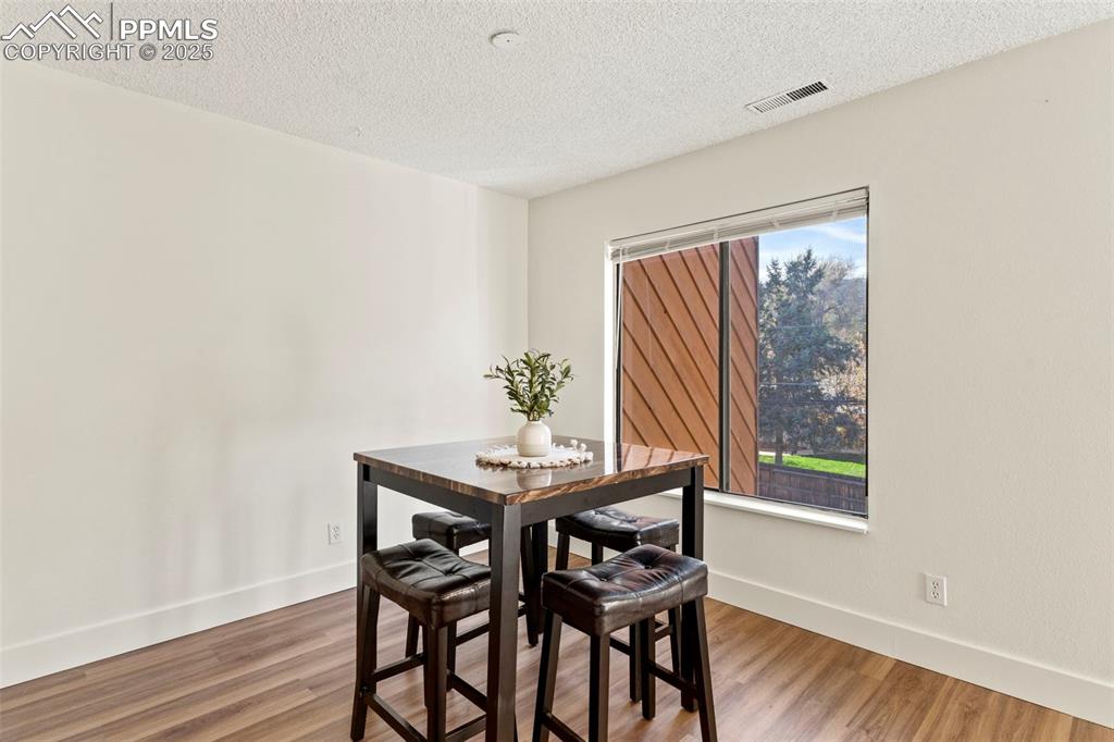 Image 9 of 29: Dining area with mountain views
