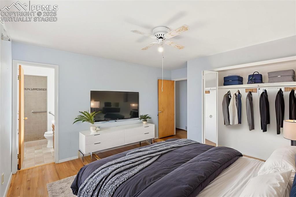 Image 17 of 32: "Virtually Staged"
Primary bedroom with ample closet space and ensuite bat