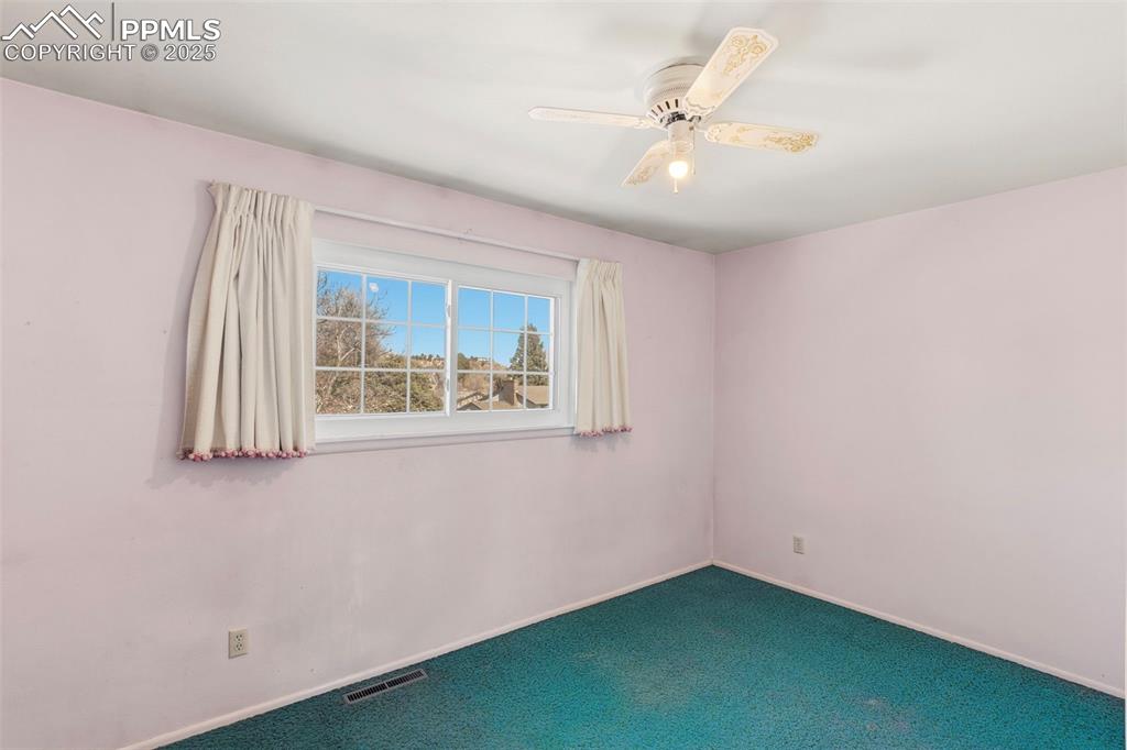 Image 20 of 32: Bedroom on upper level 14