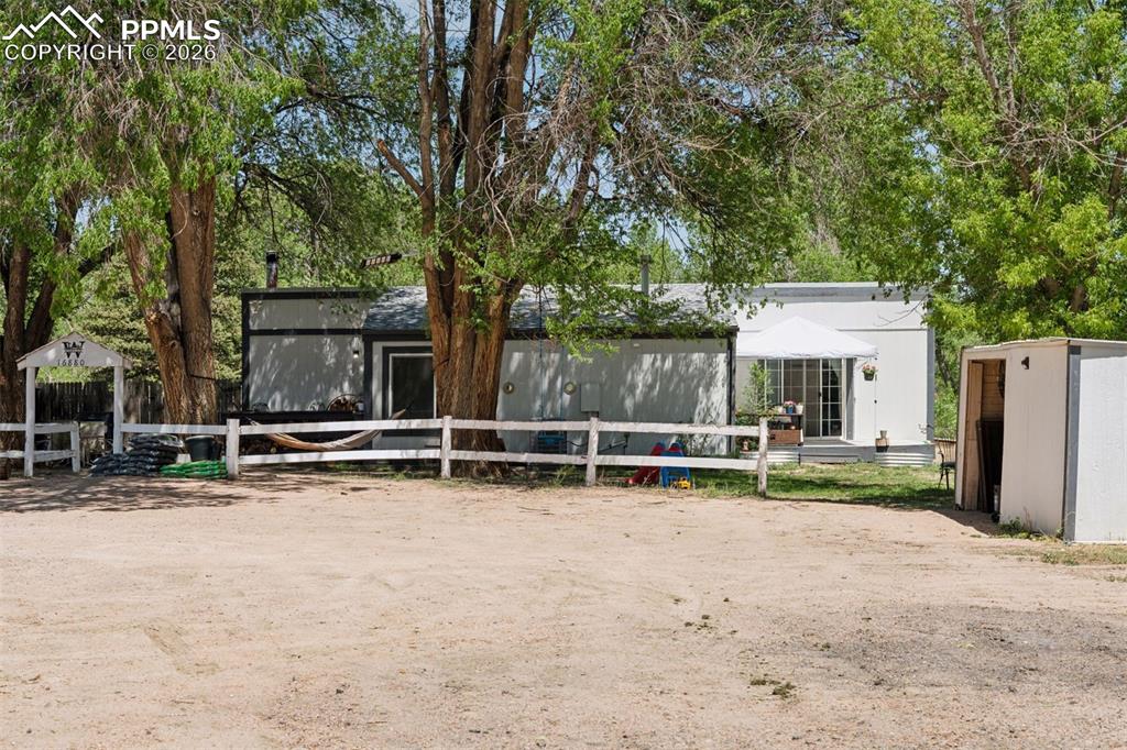 Image 22 of 49: Exterior view of the second single-family residence featuring a 3-bedroom, 