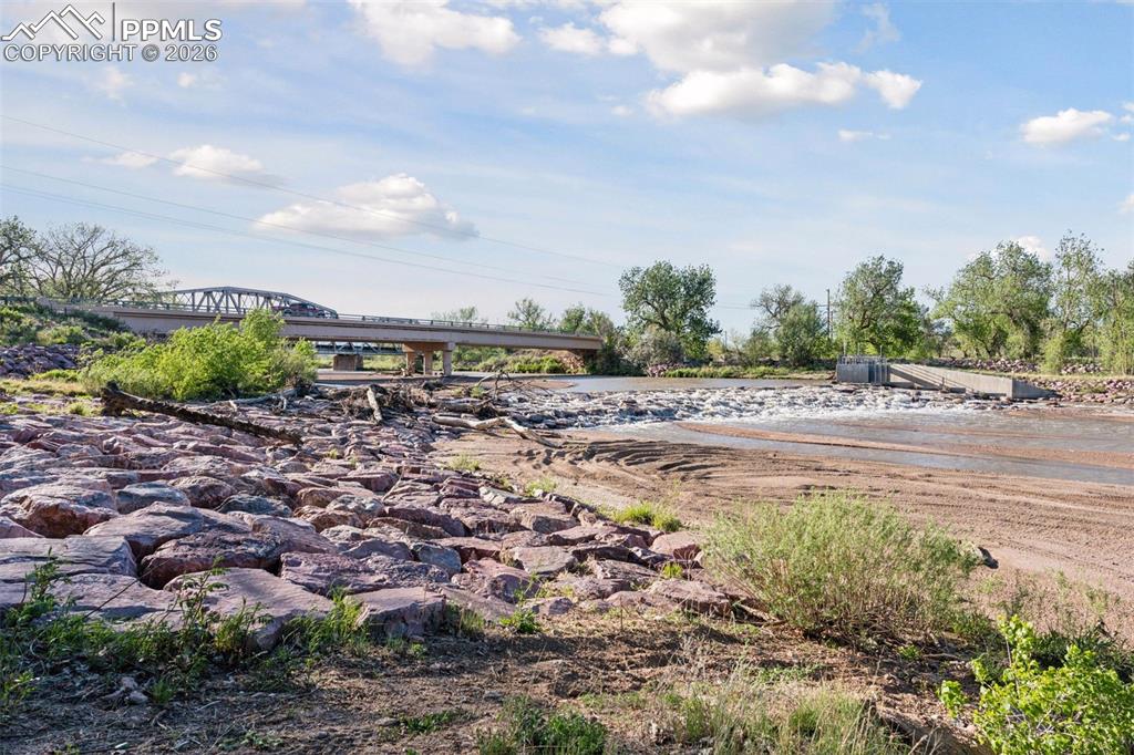 Image 42 of 49: Fountain Creek corridor near Old Pueblo Road and Hanover Road, showcasing t