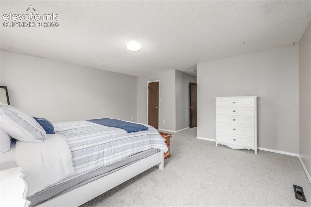 Image 23 of 36: Master Bedroom