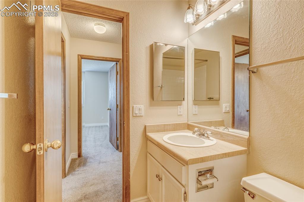Image 29 of 46: Upper level full bathroom