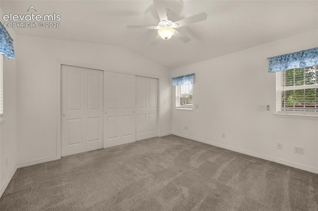 Image 16 of 50: Main Level Primary Suite