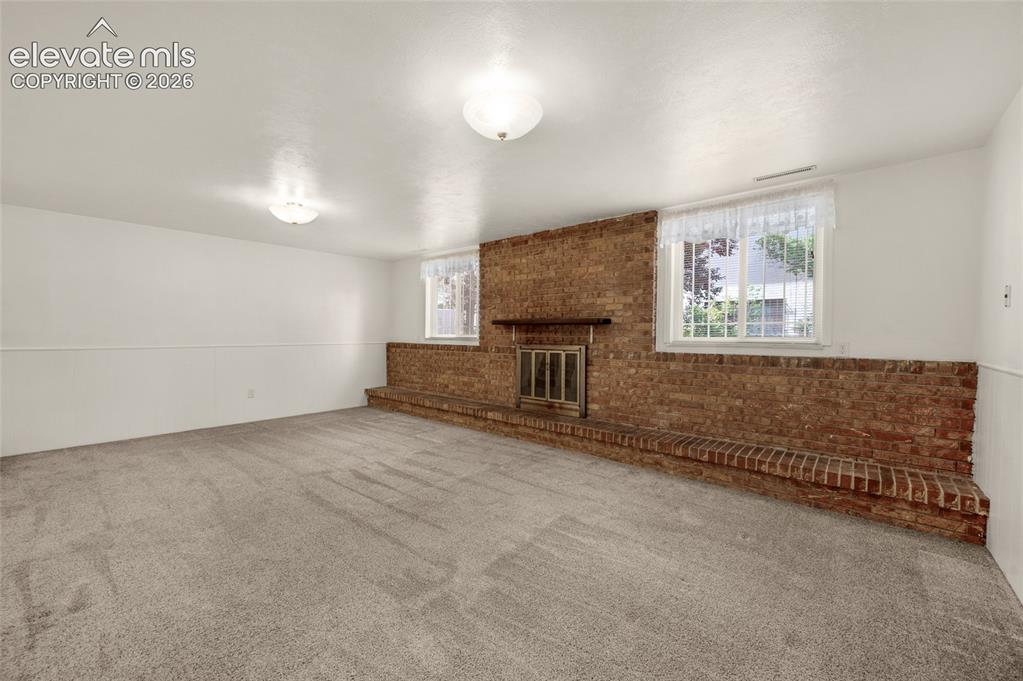 Image 36 of 50: Spacious Rec Room In Lower Level