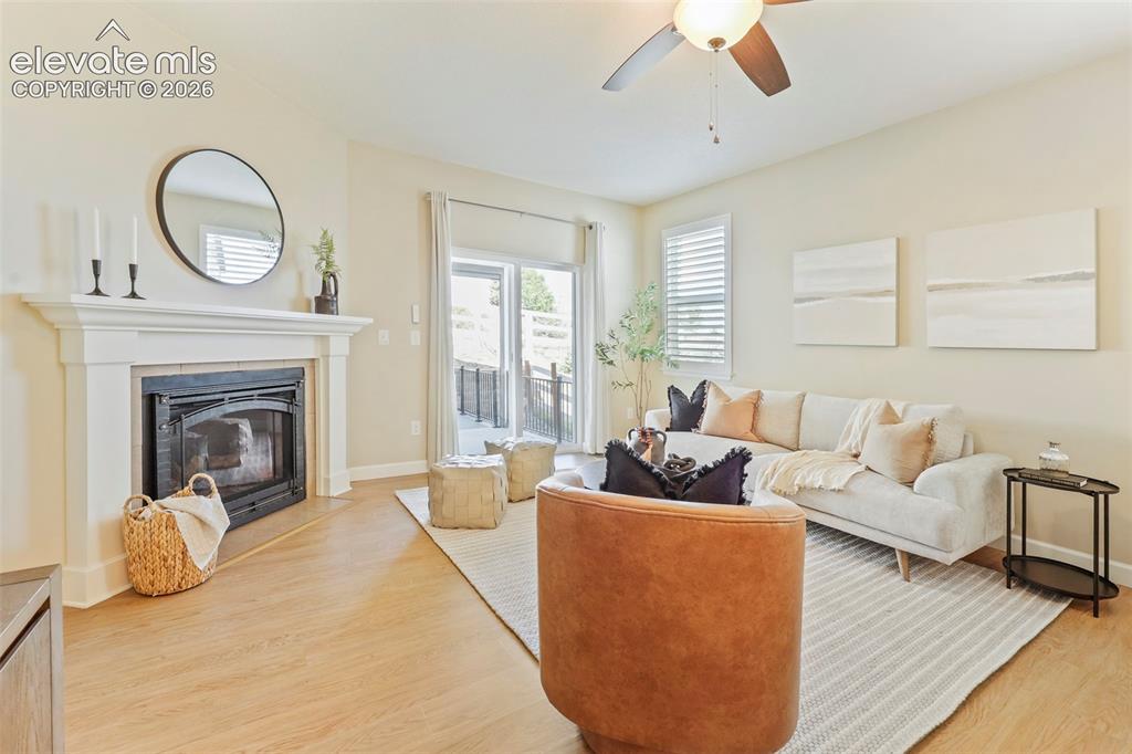 Image 12 of 49: cozy living room, gas fireplace