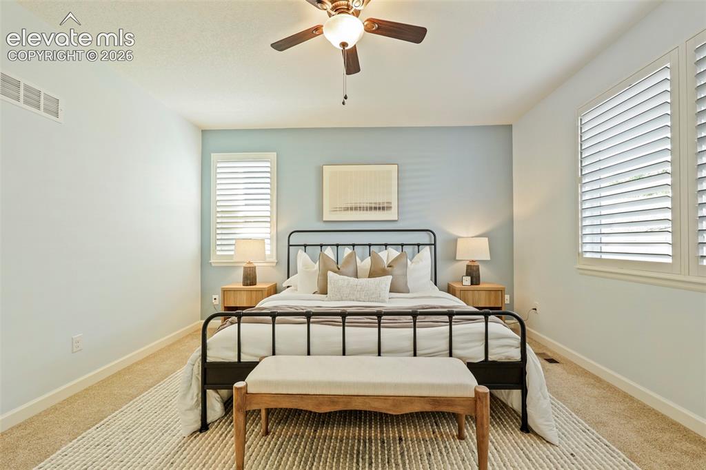 Image 21 of 49: king bed & nightstands