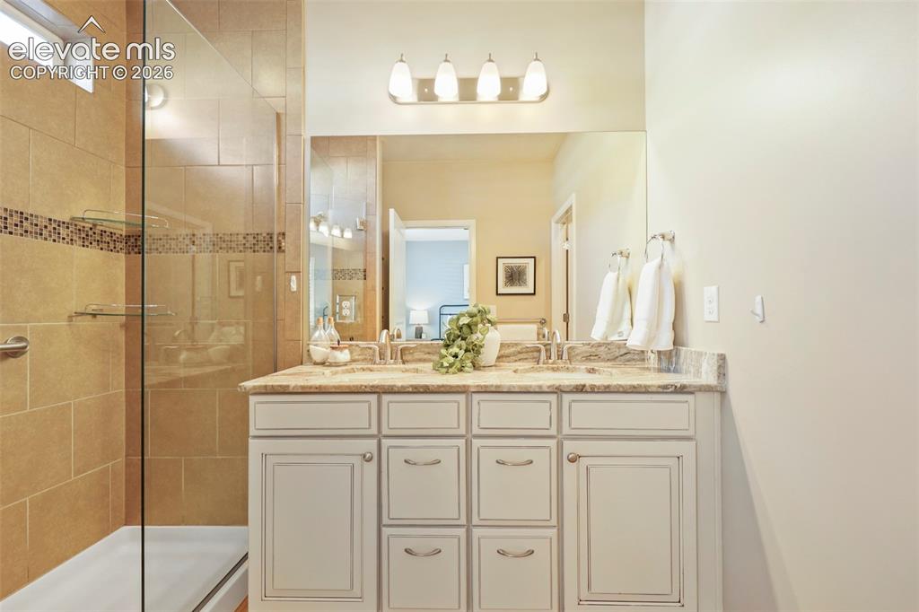 Image 25 of 49: double vanities