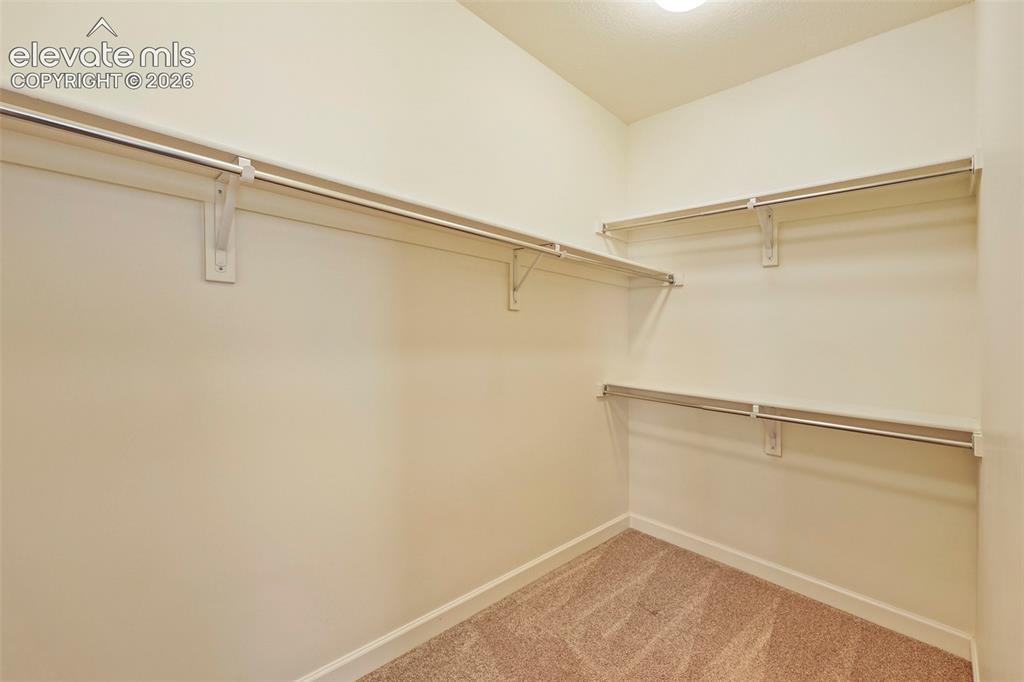Image 27 of 49: large walk-in closet