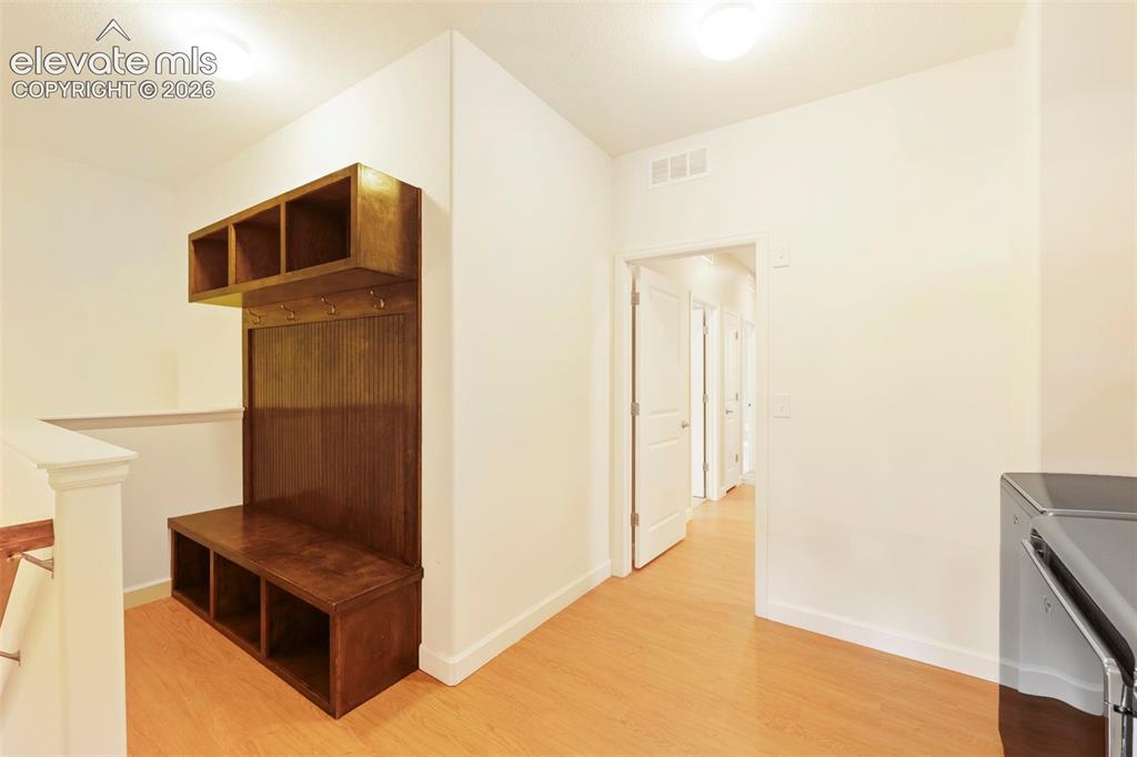 Image 32 of 49: coat rack with cubbies