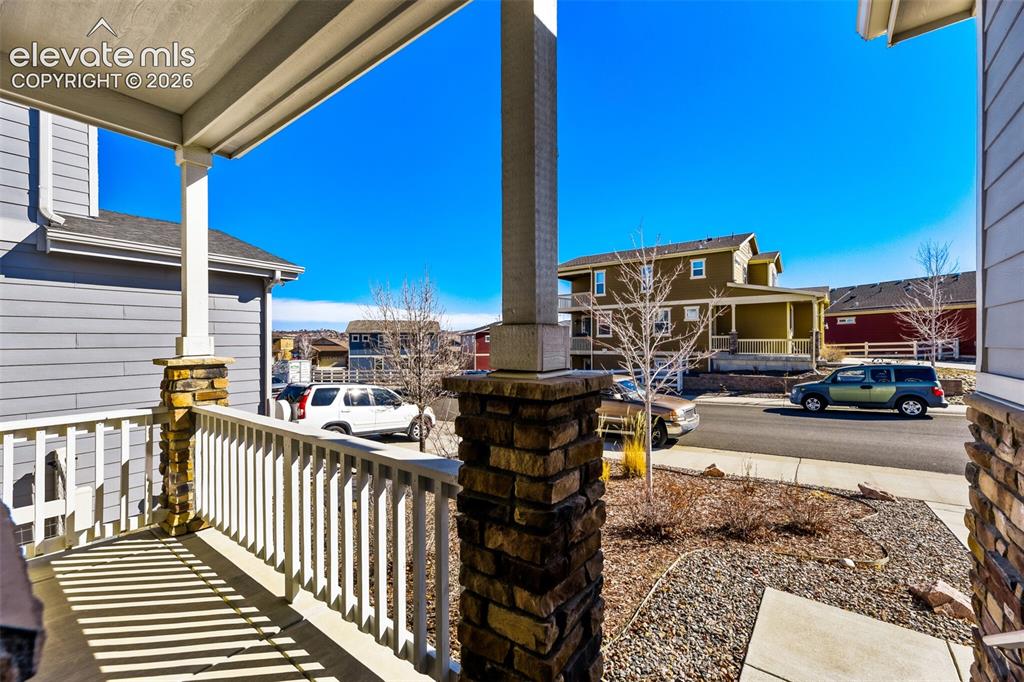 Image 5 of 49: cozy front porch