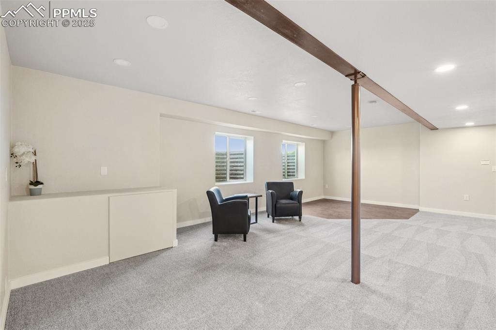 Image 32 of 46: Below grade area featuring light colored carpet and recessed lighting