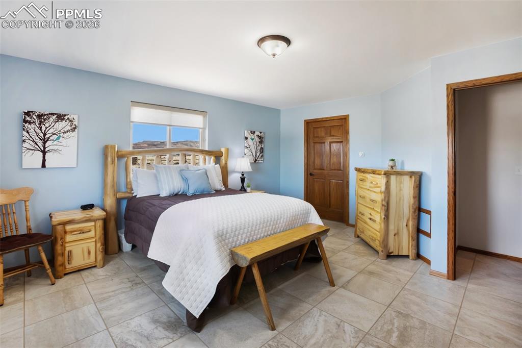 Image 21 of 50: Master Bedroom