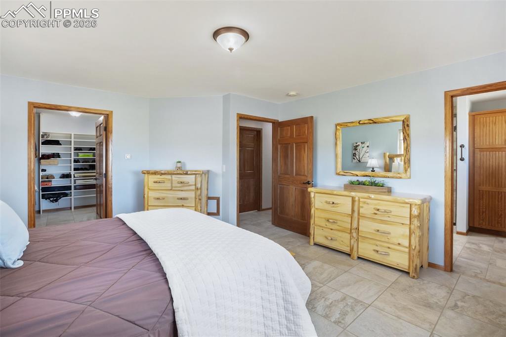 Image 22 of 50: Master Bedroom