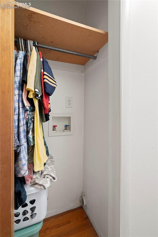Image 16 of 42: Hall closet w/ laundry hookups