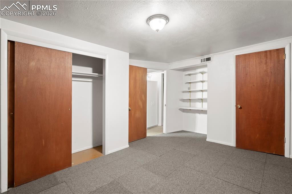 Image 28 of 42: bedroom in basement