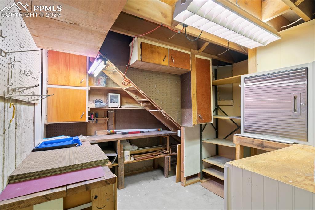 Image 30 of 42: workshop in basement