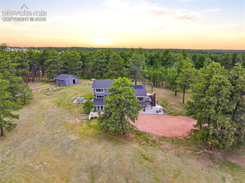 Caption: Serene country living on 4.75 acres zoned for horses, just minutes from town