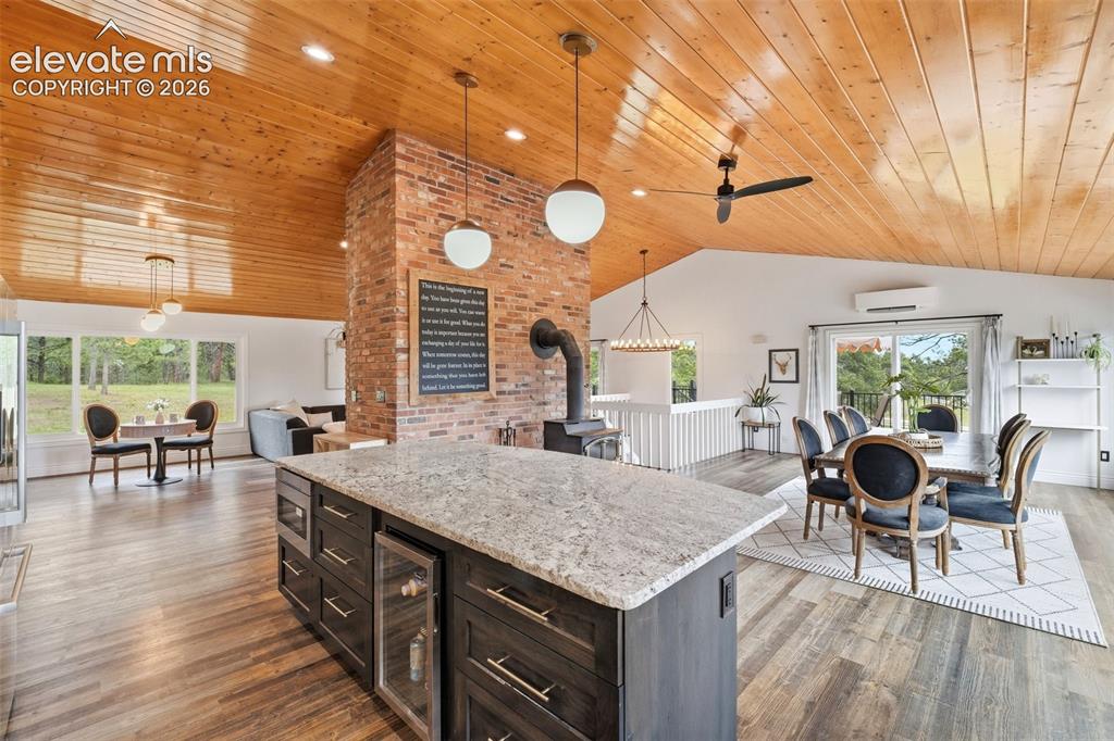 Image 12 of 50: Stunning kitchen remodel with open view to living area