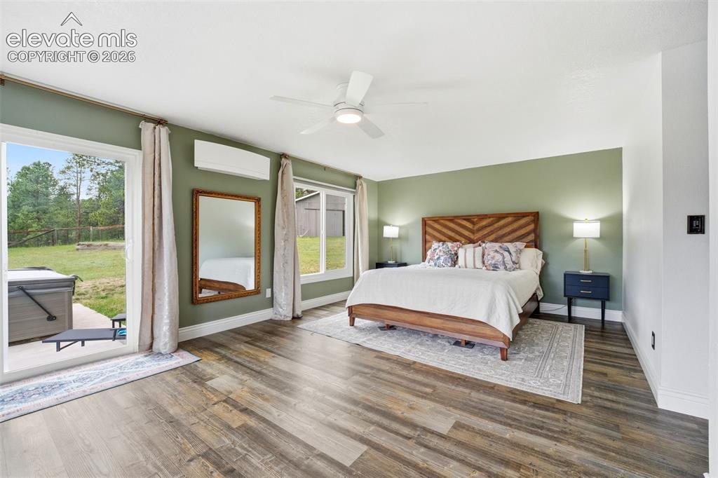 Image 21 of 50: Step out from the dining area to relax and unwind on the new deck