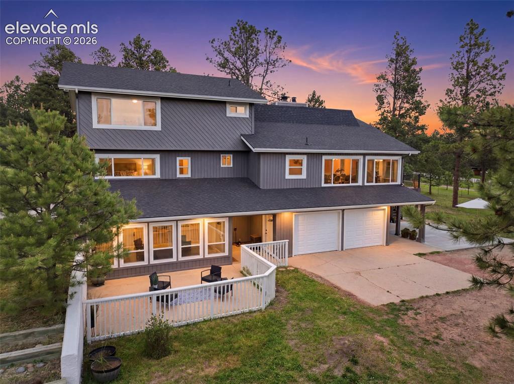Image 3 of 50: Enjoy premium outdoor living with a new custom deck, fresh concrete patio, 