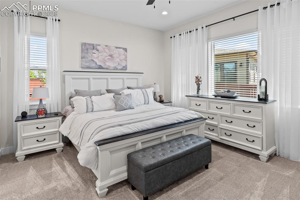 Image 30 of 48: Bedroom featuring light carpet and recessed lighting