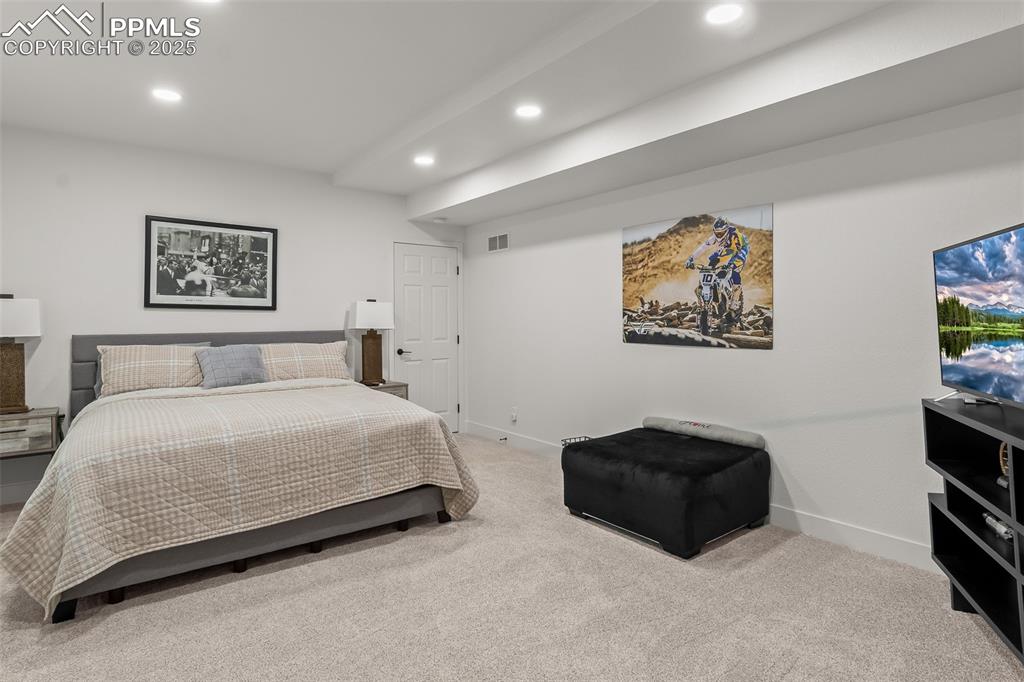 Image 44 of 48: Bedroom featuring carpet floors and recessed lighting