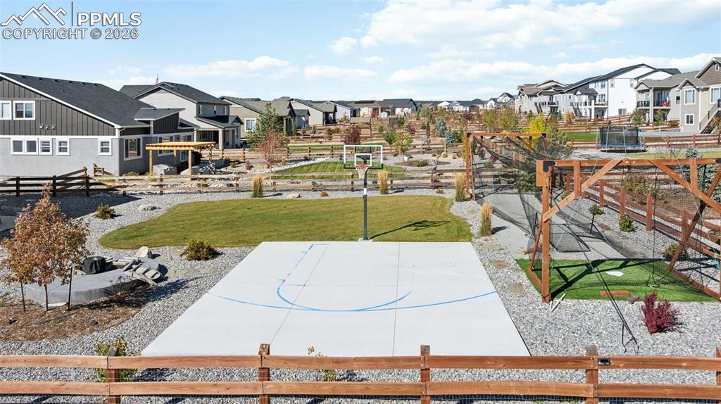 Image 12 of 39: Private Batting Cage and Basketball Court included.