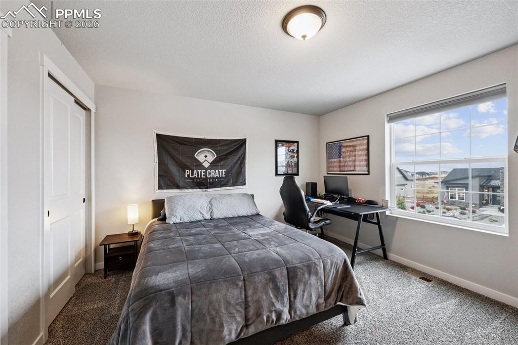 Image 22 of 39: Bedroom